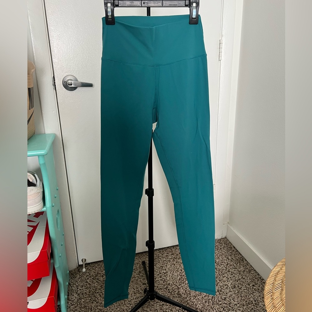 Teal/deep blue BuffBunny leggings. Nubre fabric.